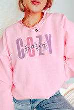 Load image into Gallery viewer, a woman wearing a pink sweatshirt with the word cozy on it